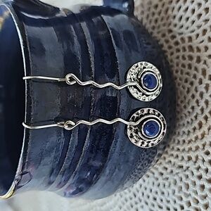 Art style dangle earrings with Blue stone in center. Fishhook backing New